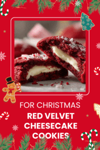 Close-up of red velvet cheesecake cookies with a creamy filling, topped with crushed candy canes, surrounded by holiday lights.