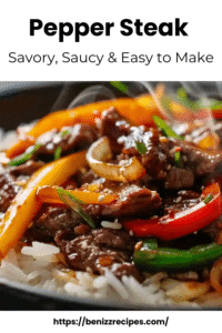 Close-up of pepper steak with bell peppers, onions, and sesame seeds served over white rice