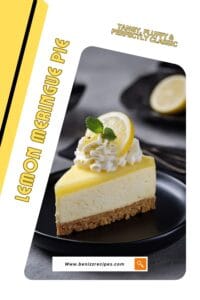 Slice of lemon cheesecake topped with whipped cream, mint leaves, and a lemon slice on a black plate
