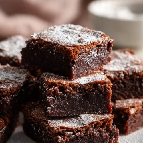 Delicious Irish cream brownies topped with chocolate drizzle