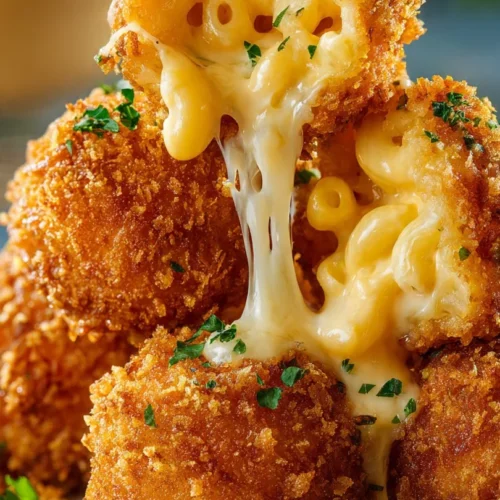 Crispy air fryer mac and cheese balls plated on a table