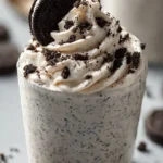 Delicious cookies and cream mousse dessert in a glass