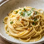 Delicious garlic butter pasta dish prepared in one pot, with fresh herbs and parmesan.