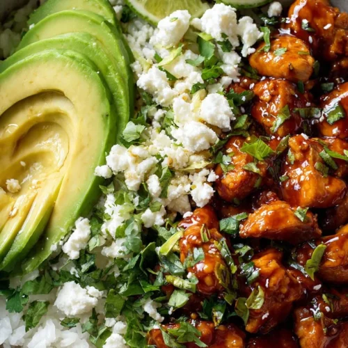 Honey Lime Chicken served with avocado rice in a vibrant bowl