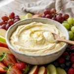 Delicious Lemon Cheesecake Fruit Dip served with fresh fruit