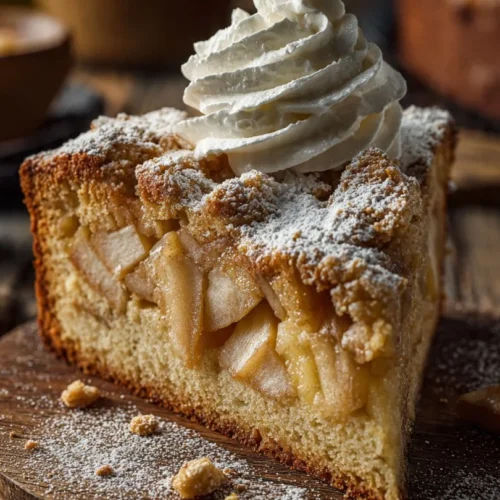 Old Irish Apple Cake with fresh apples and spices, served on a wooden table