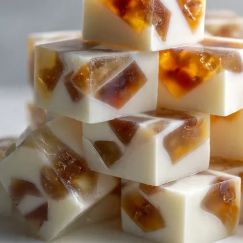 Delicious Root Beer Float Jello dessert topped with whipped cream