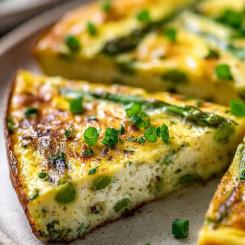 Savory asparagus and feta frittata, a delicious breakfast dish.