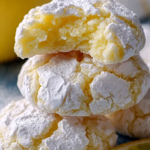 Freshly baked lemon gooey butter cookies on a plate