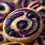 Delicious blueberry cheesecake cookies on a plate, perfect for dessert lovers