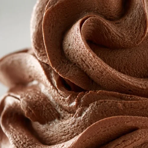 Delicious chocolate stabilized whipped cream in a bowl, ideal for desserts.