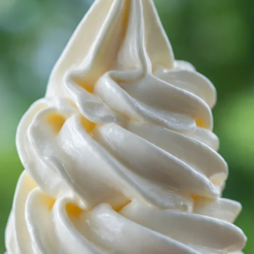 Delicious homemade Copycat Pineapple Dole Whip served in a bowl.