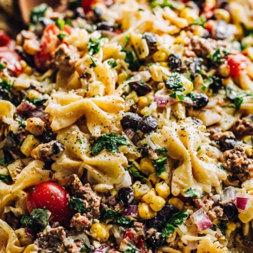Creamy cowboy pasta salad in a bowl, perfect for potlucks.