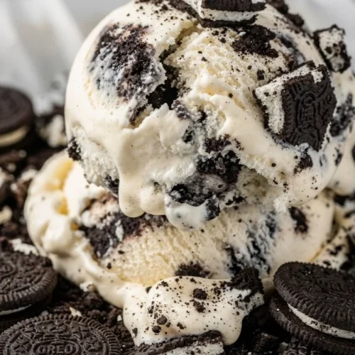 Bowl of easy cookies and cream ice cream topped with chocolate cookie pieces