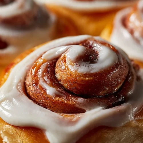 Easy one hour cinnamon rolls fresh out of the oven, soft and irresistible.