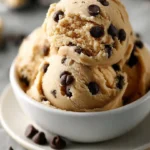 Bowl of edible cookie dough with chocolate chips and sprinkles