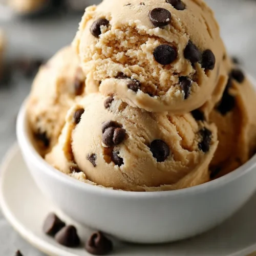 Bowl of edible cookie dough with chocolate chips and sprinkles