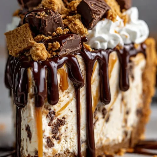 Giant S'mores Cookie Dough Pie topped with chocolate and marshmallows