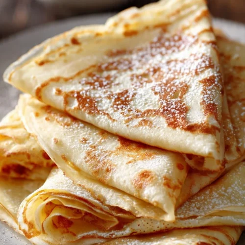 Delicious homemade crepes filled with fresh fruits and cream
