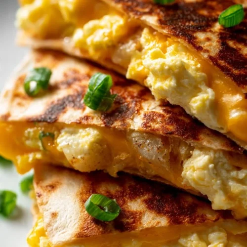 Irresistible Breakfast Crunchwrap filled with eggs, cheese, and bacon