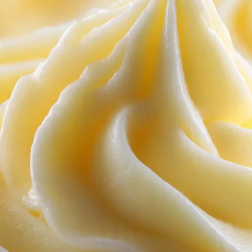Delicious lemon buttercream frosting decorated on a cake