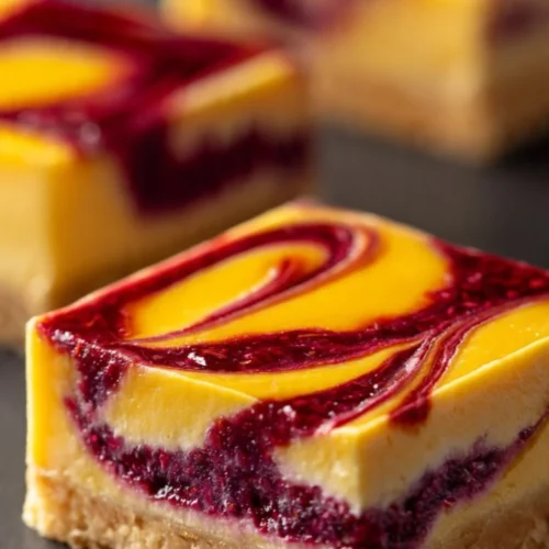 Delicious homemade mango curd bars with a creamy texture and vibrant color.