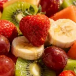 Bowl of vibrant old fashioned fruit salad with assorted fresh fruits