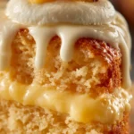 Delicious Pineapple Heaven Cake topped with fresh pineapple slices and creamy frosting.