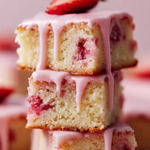 Delicious Strawberry Lemon Blondies with fresh strawberries and a lemon drizzle