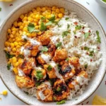 Delicious Street Corn Chicken Rice Bowl with grilled chicken and sweet corn