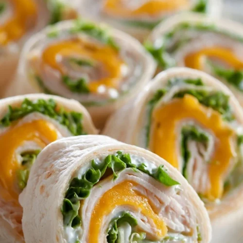 Turkey and Cheddar Lunch Roll Ups plated for a tasty meal