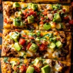 Delicious homemade taco pizza topped with fresh ingredients