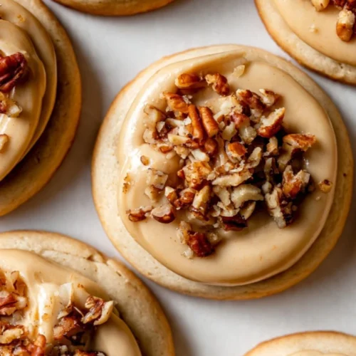 Delicious homemade caramel apple cookies on a plate.