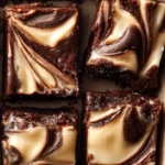 Fudgy cheesecake brownie with creamy topping and rich chocolate base