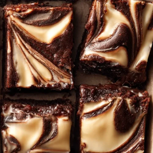 Fudgy cheesecake brownie with creamy topping and rich chocolate base