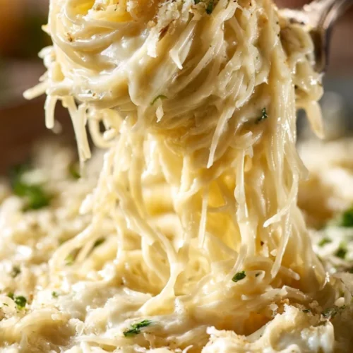 Creamy Garlic Parmesan Pasta served with parsley on a plate