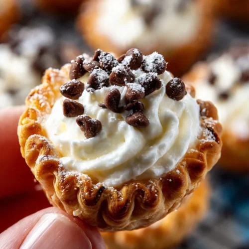 Mini cannoli cups filled with sweet ricotta cream and chocolate chips