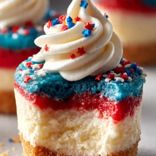 Delicious mini cheesecakes topped with berries and whipped cream