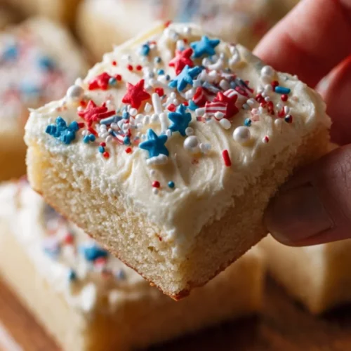 Patriotic Sugar Cookie Bars decorated with red, white, and blue icing