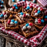 Colorful red, white, and blue Fourth of July popsicles on a festive table