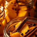 Jar of sweet and spicy home canned peaches ready for serving