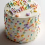 Delicious birthday cake with colorful frosting and candles for a celebration