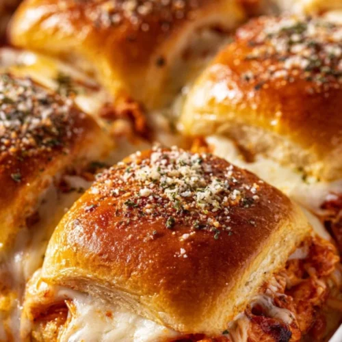 Delicious buffalo chicken sliders served on a platter for a party