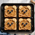 Healthy breakfast options for six children including fruits, pancakes, and cereals